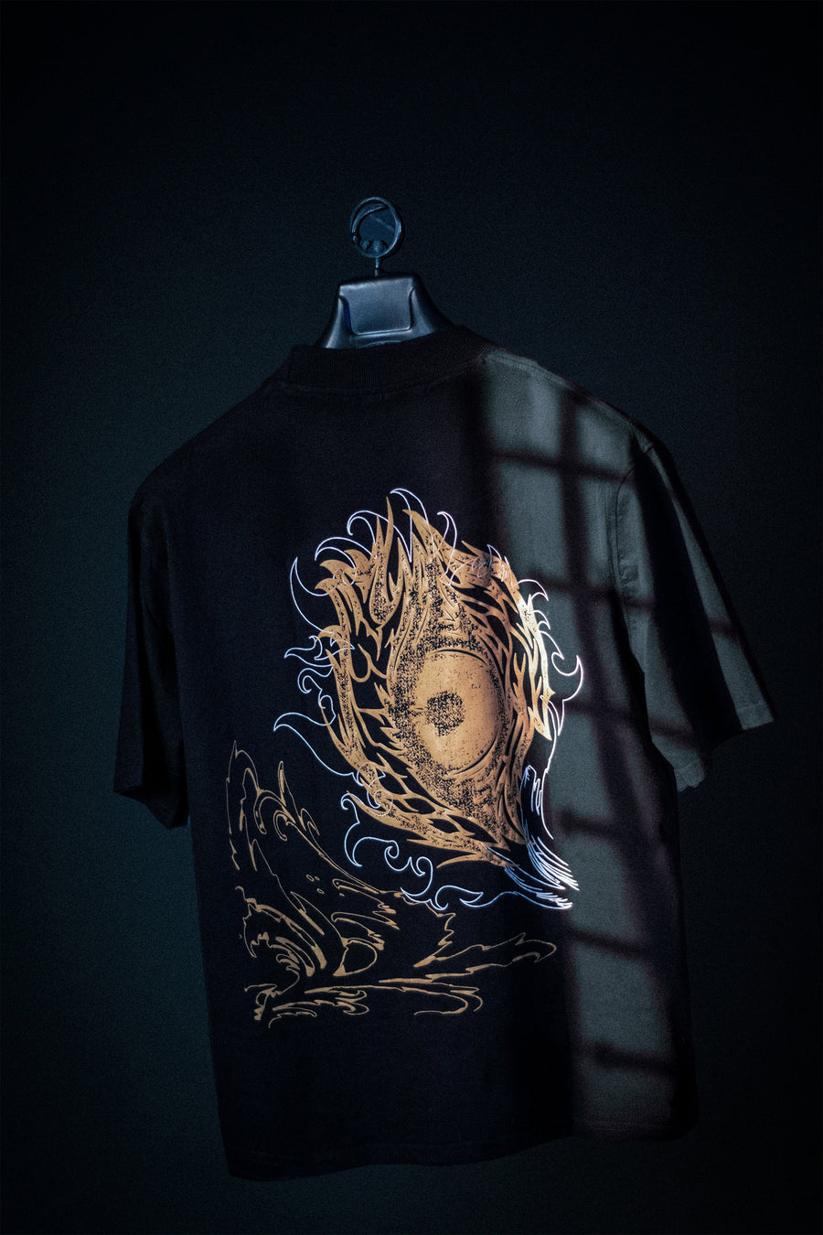 Black oversized graphic tee with intricate occult back print — dark luxury streetwear | YTHRAL© Night Gaze