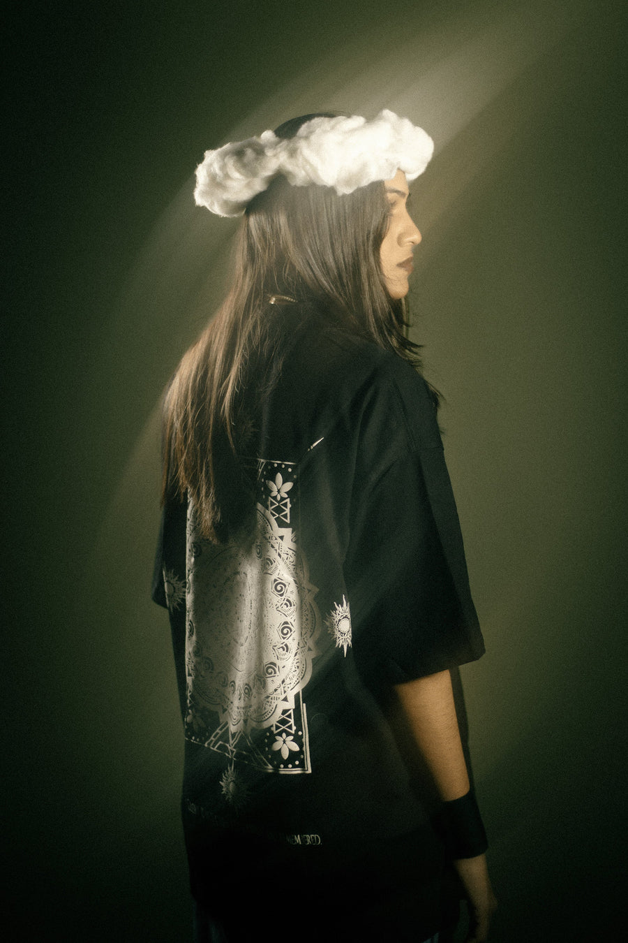 Model wearing onyx black oversized t-shirt in heavy cotton — dark luxury streetwear | YTHRAL© Elysium