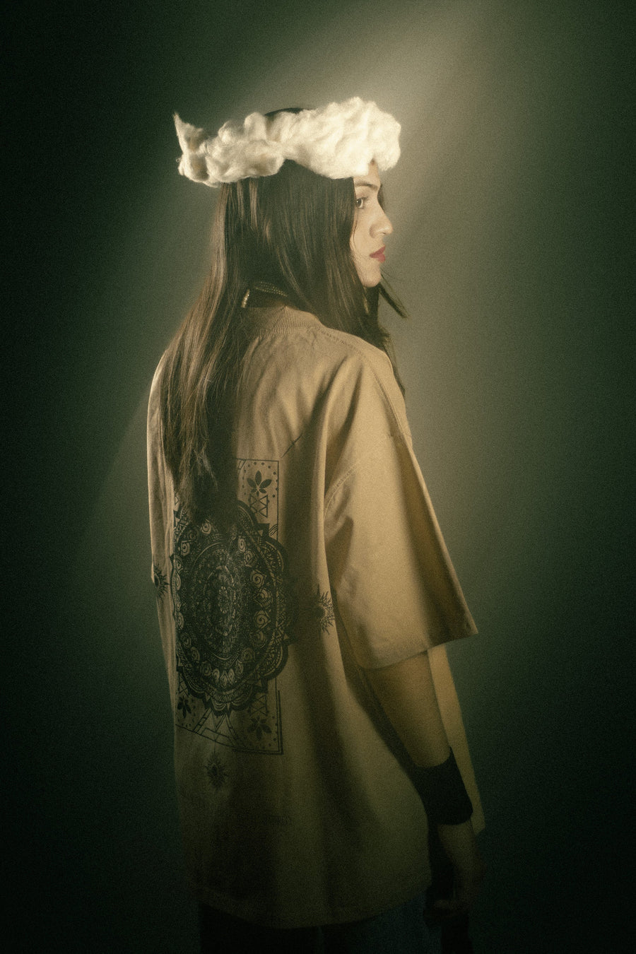 Model wearing bone beige oversized t-shirt in heavy cotton — dark luxury streetwear | YTHRAL© Elysium
